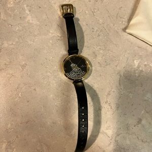 Brand new black and gold Kate spade watch with champagne design!